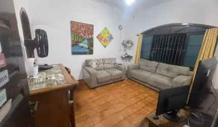 Casa em condomínio fechado com 2 quartos à venda na Rua Botões de Ouro, 437, Jardim Real, Praia Grande, 93 m2 por R$ 420.000