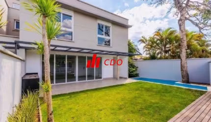 Jardim Cordeiro sobrado em condomínio de alto padrão a venda, com 4 suítes, sala para 3 ambientes, piscina, churrasqueira, quintal, área útil de 425m²
