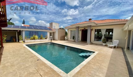 PARQUE DA FAZENDA - AT 1.230m² - AC 700m² - 4 SUÍTES - 6 VAGAS - PISCINA