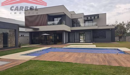 TERRA CAXAMBÚ - 4 SUÍTES - 4 VAGAS - AT 1.070m² - AC 400m² - PISCINA