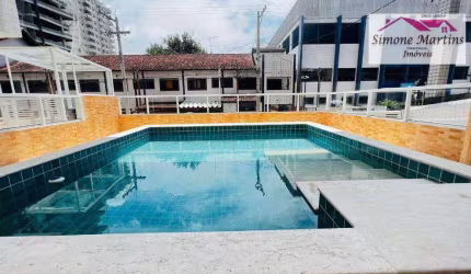 Apartamento com 2 dormitórios à venda, 67 m² por R$ 450.000,00 - Caiçara - Praia Grande/SP