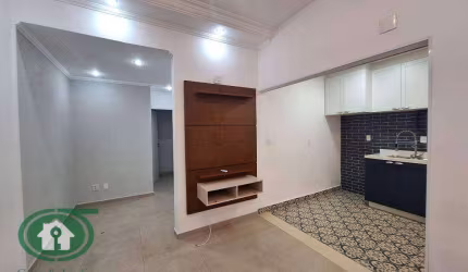 Apartamento térreo com 1 dormitório para alugar, 43 m² - Encruzilhada - Santos/SP