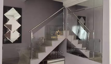 Sobrado com 3 dormitórios à venda, 136 m² por R$ 700.000 - Vila Homero Thon - Santo André/SP
