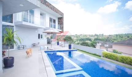 Luxuosa casa em condomínio à venda em Cotia-SP, bairro São Paulo II, com 4 quartos, 3 suítes, 1 sala, 5 banheiros e 632m².