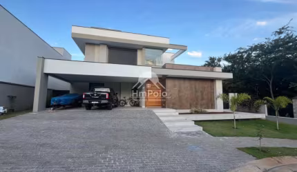 Casa à venda com 3 suítes, escritório, área gourmet, 4 vagas no Swiss Park em Campinas/SP.