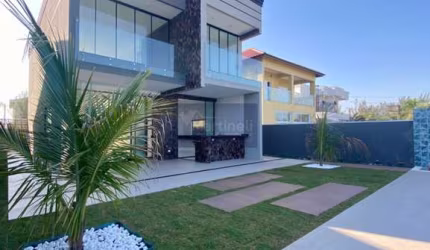 Casa em Condomínio de Luxo na Guacira, Itanhaém-SP! 4 Quartos, 4 Suítes, 3 Salas - Imperdível!