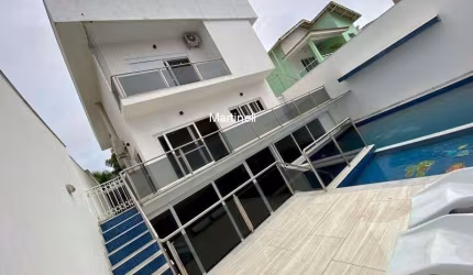 Imperdível casa em condomínio com 5 quartos e 4 suítes no Centro de Itanhaém-SP!