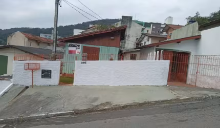 casa de madeira + terreno com 385 m²  - CA1455