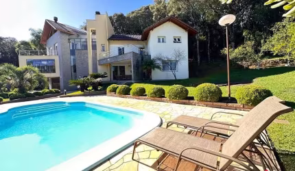Casa em Condominio para Venda - 583m², 4 dormitórios, sendo 3 suites, 4 vagas - Linha 40