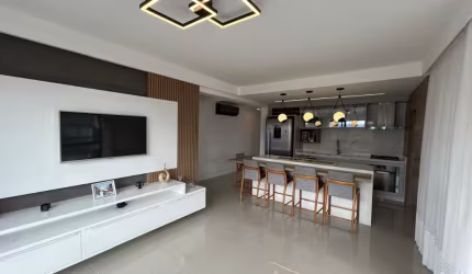 APARTAMENTO SEMIMOBILIADO COM VISTA PARA O MAR COM 3 QUARTOS SENDO 1 SUÍTE E 2 VAGAS DE GARAGEM NO BALNEÁRIO EM FLORIANÓPOLIS/SC