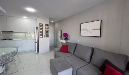 APARTAMENTO SEMIMOBILIADO COM VISTA PANORÂMICA NA AGRONÔMICA COM 3 QUARTOS SENDO 1 SUÍTE E 1 VAGA DE GARAGEM