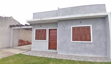 Casa 02 Dorm à venda no Bairro CAPÃO NOVO - 2 vagas de garagem