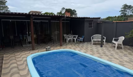 Casa 02 Dorm à venda no Bairro CAPÃO NOVO - 2 vagas de garagem