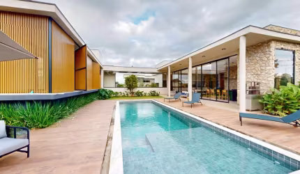 Casa térrea alto padrão para venda 4 suítes e piscina no Residencial Jequitibá.