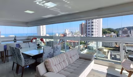 Apartamento com 3 suítes  decorado com vista mar à venda na praia da Enseada