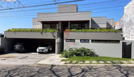 LINDA CASA EM CONDOMÍNIO FECHADO SAO JOSE FLORIPA SC COM 5 QUARTOS E 6 BANHEIROS À VENDA