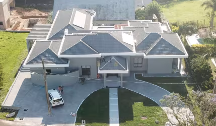 Casa com 5 dormitórios à venda, 437 m² por R$ 3.100.000 - Condomínio Vale do Lag