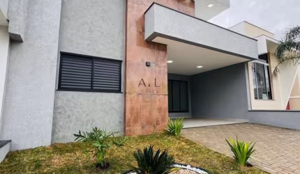 Casa com 3 dormitórios à venda, 118 m² por R$ 730.000,00 - Condomínio Terras de