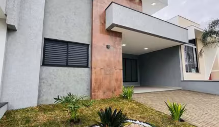 Casa com 3 dormitórios à venda, 118 m² por R$ 730.000,00 - Condomínio Terras de