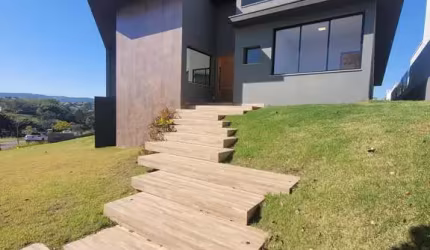Casa com 3 dormitórios à venda, 302 m² por R$ 2.990.000,00 - Condomínio Campos d