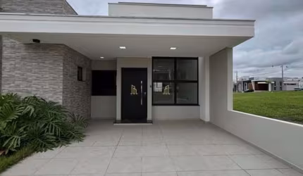 Casa com 3 dormitórios à venda, 104 m² por R$ 615.000,00 - Condomínio Villaggio