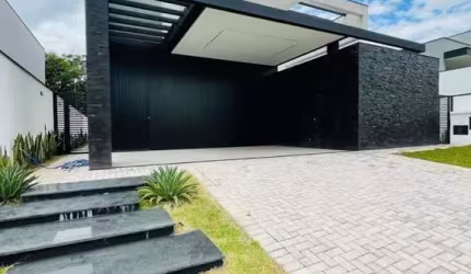 Sobrado com 3 dormitórios à venda, 326 m² por R$ 2.790.000,00 - Condomínio Alpha