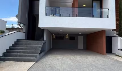Casa com 3 dormitórios à venda, 220 m² por R$ 1.550.000 - Condomínio Residencial