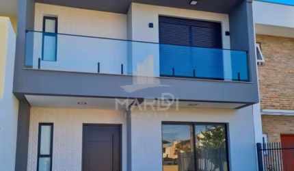 Casa em condomínio fechado com 3 quartos à venda na Rua Angico, 43, Hípica, Porto Alegre por R$ 730.000