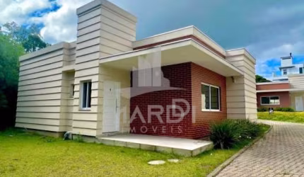 Casa em condomínio fechado com 3 quartos à venda na Rua Canísio Binsfeld, 228, Hípica, Porto Alegre por R$ 655.000