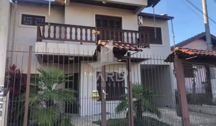 Casa com 3 quartos à venda na Rua Juvenil Pereira Fraga, 104, Cavalhada, Porto Alegre por R$ 900.000
