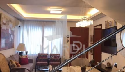 Casa com 3 quartos à venda na Rua Irmão Jaime Biazus, 73, Guarujá, Porto Alegre por R$ 530.000