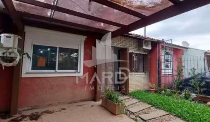 Casa com 3 quartos à venda na Avenida Nossa Senhora de Guadalupe, 330, Hípica, Porto Alegre por R$ 330.000