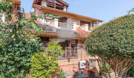 Casa em condomínio fechado com 3 quartos à venda na Avenida da Cavalhada, 6021, Cavalhada, Porto Alegre por R$ 560.000