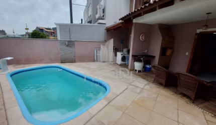 Casa em condomínio fechado com 3 quartos à venda na Rua Carlos Maximiliano Fayet, 215, Hípica, Porto Alegre por R$ 600.000