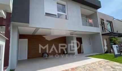 Casa em condomínio fechado com 3 quartos à venda na Rua Ivo Walter Kern, 599, Hípica, Porto Alegre por R$ 1.100.000