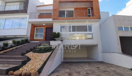 Casa em condomínio fechado com 3 quartos à venda na Rua Francisco Solano Borges, 200, Hípica, Porto Alegre por R$ 1.250.000