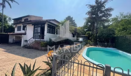 Casa em condomínio fechado com 4 quartos à venda na Rua Pedro A. A. de Freitas Filho, 186, Jardim Itu Sabará, Porto Alegre por R$ 1.200.000
