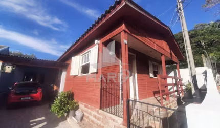 Casa com 2 quartos para alugar na Rua Álvaro Guterres, 680, Tristeza, Porto Alegre por R$ 1.400