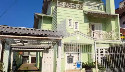 Casa com 4 quartos à venda na Rua Folha da Tarde, 49, Cristal, Porto Alegre por R$ 1.635.000