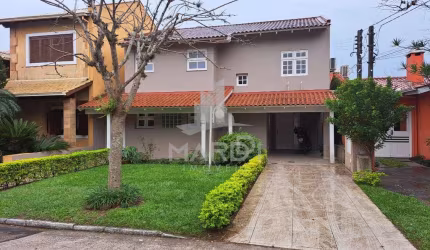 Casa em condomínio fechado com 4 quartos à venda na Avenida Juca Batista, 1200, Ipanema, Porto Alegre por R$ 890.000