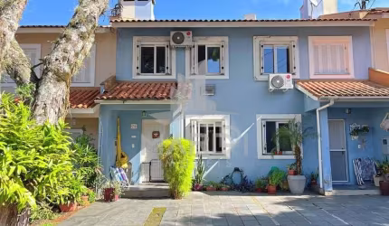 Casa em condomínio fechado com 2 quartos à venda na Estrada João Salomoni, 131, Vila Nova, Porto Alegre por R$ 425.000