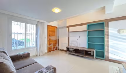 Casa com 2 quartos à venda na Rua Irmão Jaime Biazus, 231, Guarujá, Porto Alegre por R$ 350.000