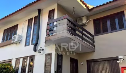 Casa em condomínio fechado com 3 quartos para alugar na Rua Doutor Mário Totta, 1925, Tristeza, Porto Alegre por R$ 3.500