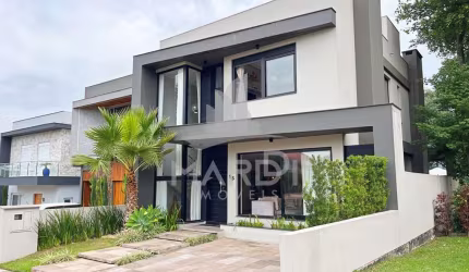 Casa em condomínio fechado com 4 quartos à venda na Rua Francisco Solano Borges, 200, Hípica, Porto Alegre por R$ 1.285.000