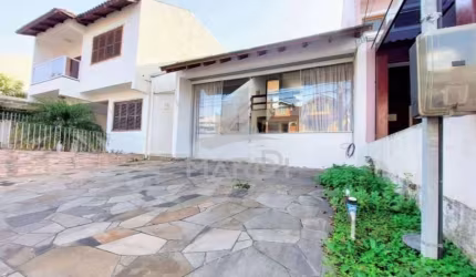 Casa em condomínio fechado com 3 quartos à venda na Rua Guatambu, 109, Hípica, Porto Alegre por R$ 535.000