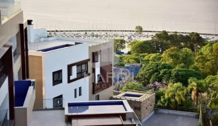 Casa em condomínio fechado com 3 quartos à venda na Rua Maracá, 186, Vila Assunção, Porto Alegre por R$ 3.990.000