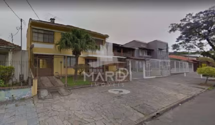 Casa com 4 quartos à venda na Rua Dona Firmina, 686, Vila São José, Porto Alegre por R$ 1.100.000