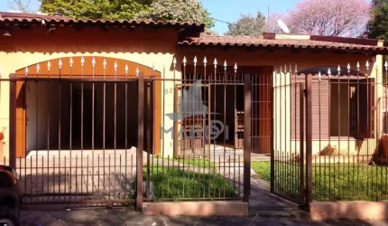 Casa com 3 quartos à venda na Rua Cachoeira, 531, Nonoai, Porto Alegre por R$ 380.000