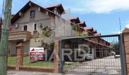 Casa em condomínio fechado com 3 quartos à venda na Rua Doutor Possidônio Cunha, 273, Vila Assunção, Porto Alegre por R$ 720.000
