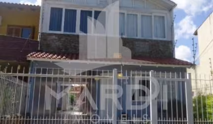 Casa com 3 quartos à venda na Rua Carlos Scliar, 99, Hípica, Porto Alegre por R$ 750.000